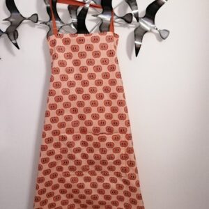 Tablier orange avec motifs pommes