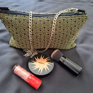 Pochette de soirée Holy dorée et noire avec fermeture éclair noire