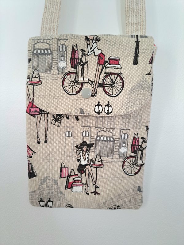 Pochette téléphone à porter en bandoulière. Motifs femmes en shopping