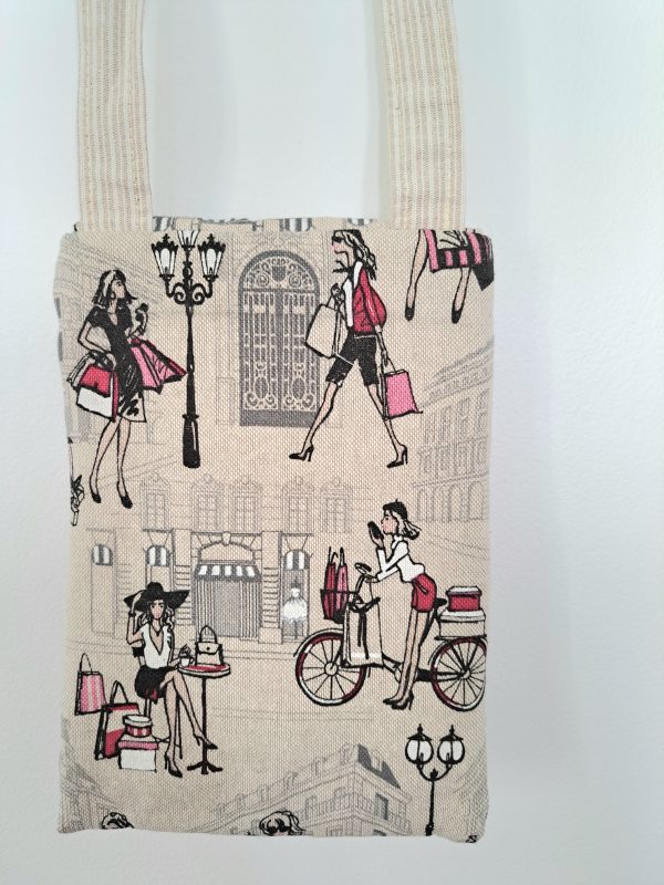 Pochette tél avec motifs féminins en shopping