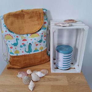 Sac ficelles dinosaures, avec rabats et fond en velours jaune