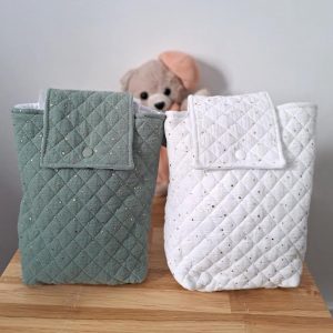 Ranges couches blanc et vert, fermeture à rabat et anse